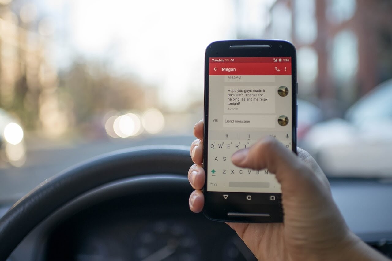 man texting while driving man texting while driving