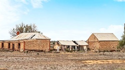 Scrubby sheep country with stone ruins sells for $650,000 near Sedan
